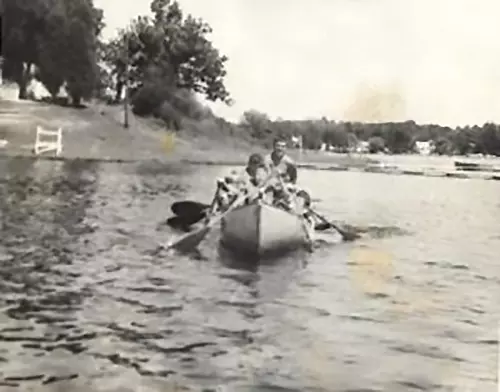 Canoeing on the lake at camp