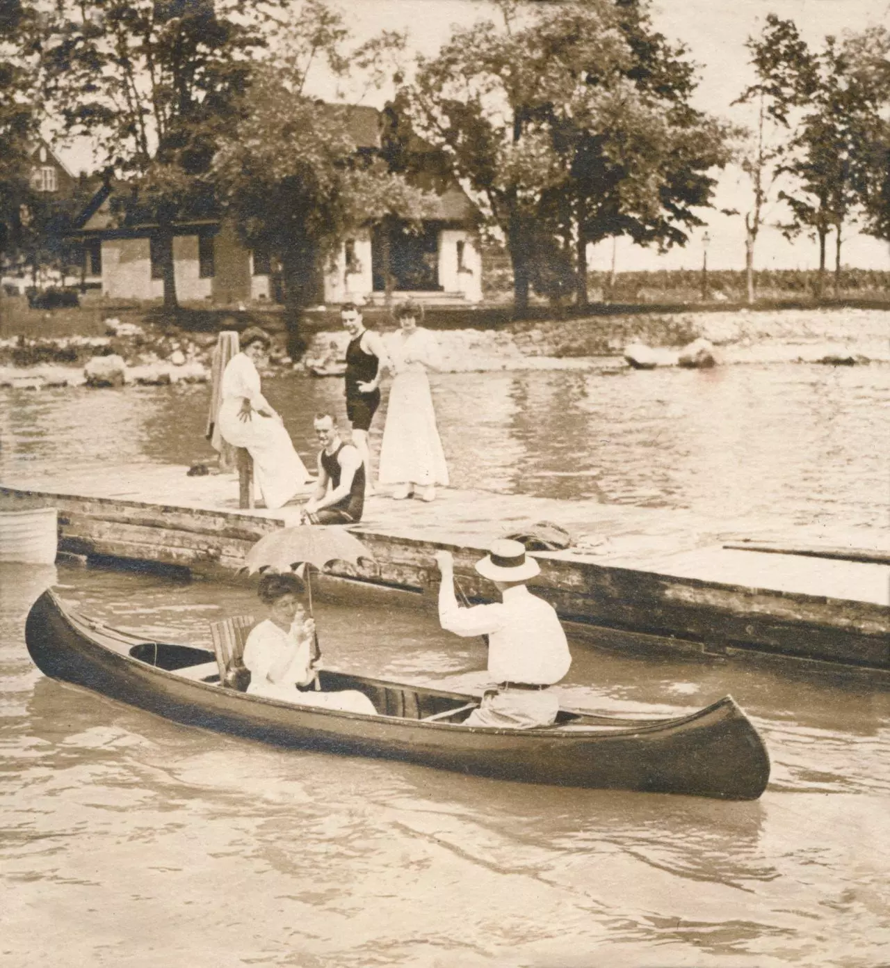 Middle Bass Club: Members enjoying the dock. Looking east from the Boat Dock.