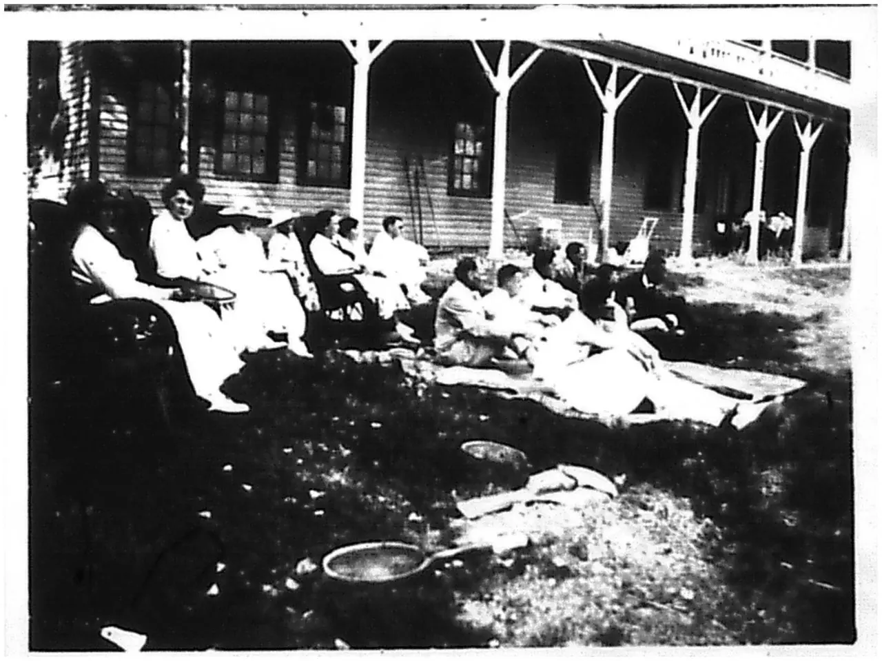 Rehberg Hall. Middle Bass Club Members watching tennis.