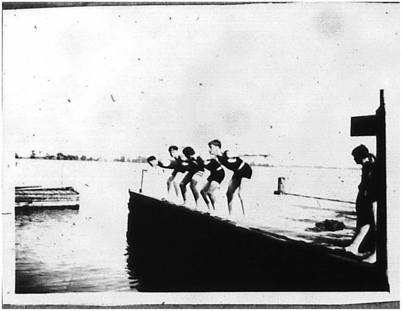 Middle Bass Club Dock. Kids jumping in Lake Erie. 