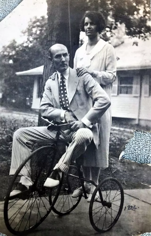 Middle Bass Club: Harold Norton and Phyllis Kinsey on the walkway of the Kinsey cottage. Looking west at the Berdan cottage. 1926