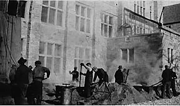 The construction of University Hall and the Field House.