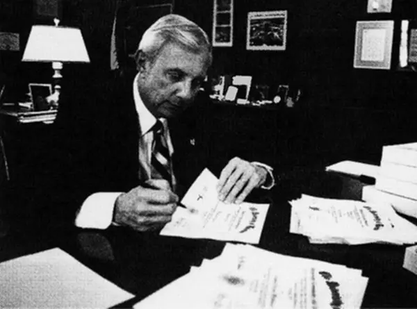 President Horton signing diplomas, 1993